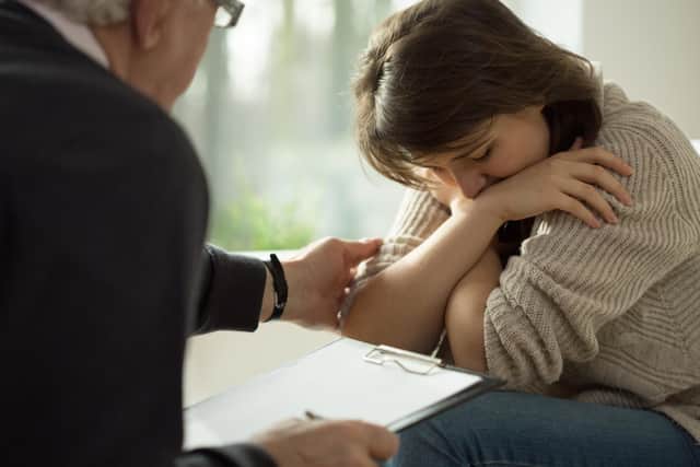 Stock image of a person in distress seeking professional support.
Picture: Shutterstock