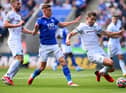 LEICESTER, ENGLAND - SEPTEMBER 25: James Tarkowski of Burnley battles for possession with Harvey Barnes of Leicester City    during the Premier League match between Leicester City and Burnley at The King Power Stadium on September 25, 2021 in Leicester, England. (Photo by Clive Mason/Getty Images)