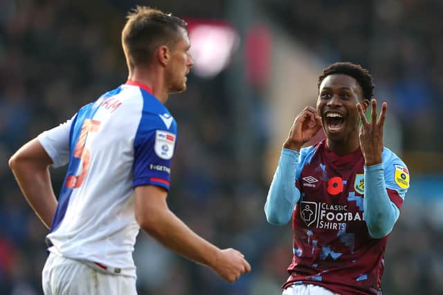 BURNLEY, ENGLAND - NOVEMBER 13: Nathan Tella of Burnley  gestures towards Dominic Hayam of Blackburn Rovers 3-0 following their sides victory in the Sky Bet Championship between Burnley and Blackburn Rovers at Turf Moor on November 13, 2022 in Burnley, England. (Photo by Nathan Stirk/Getty Images)