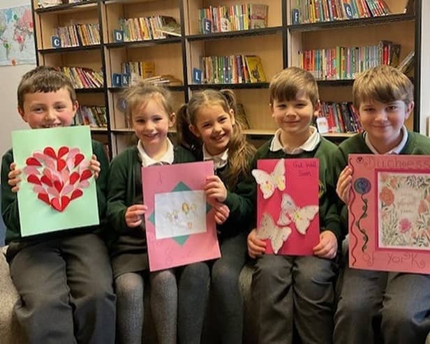 Some of the students at Padiham Green Primary School with cards they made to send to the Duchess of York Sarah Ferguson following her cancer diagnosis