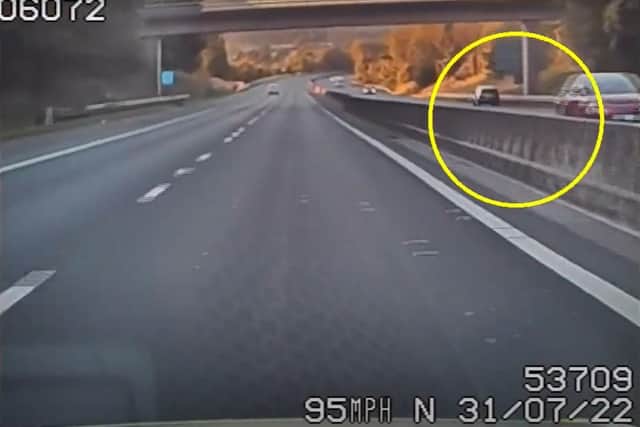Footage shows the moment a wanted man drove the wrong way on the M65 during a police pursuit (Credit: Lancashire Police)