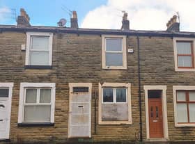 This two-bedroom, mid-terraced house is going to auction with a guide price of £10,000-plus.