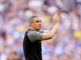 Former Claret Michael Duff applauds the fans at full-time