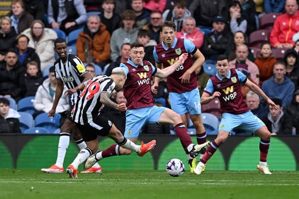 BURNLEY, ENGLAND - MAY 04: Bruno Guimaraes of Newcastle United scores his team's third goal during the Premier League match between Burnley FC and Newcastle United at Turf Moor on May 04, 2024 in Burnley, England. (Photo by Stu Forster/Getty Images)