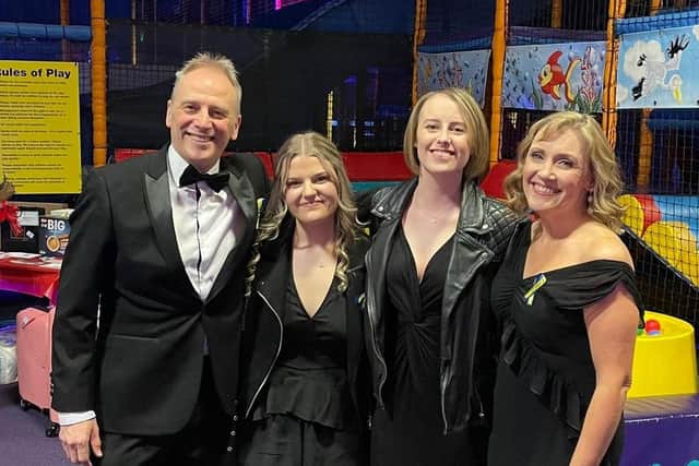 Laura (third from left) with her parents Mark and Nicola and her sister Gracie