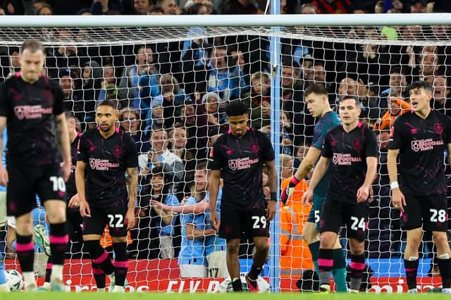 Burnley players look dejected after conceding a fourth goal

The Emirates FA Cup Quarter-Final - Manchester City v Burnley - Saturday 18th March 2023 - Etihad Stadium - Manchester