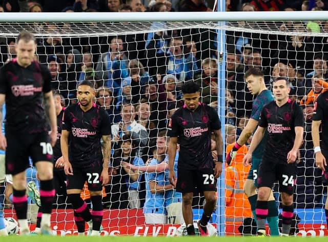 Burnley players look dejected after conceding a fourth goal

The Emirates FA Cup Quarter-Final - Manchester City v Burnley - Saturday 18th March 2023 - Etihad Stadium - Manchester