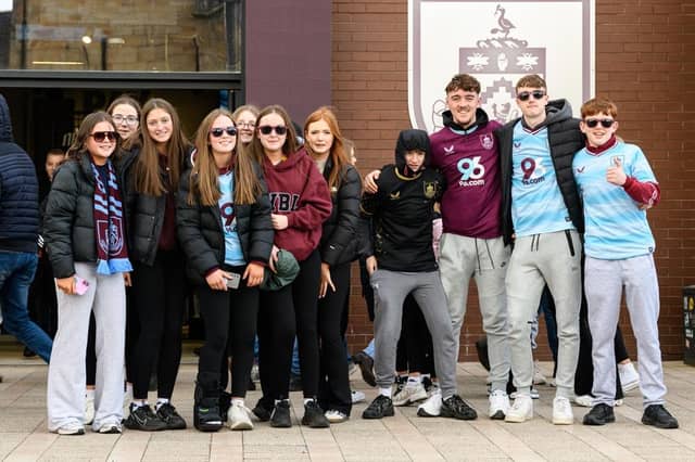 Burnley fans arrive at Turf Moor for the Premier League fixture against Brighton and Hove Albion. Photo: Kelvin Lister-Stuttard