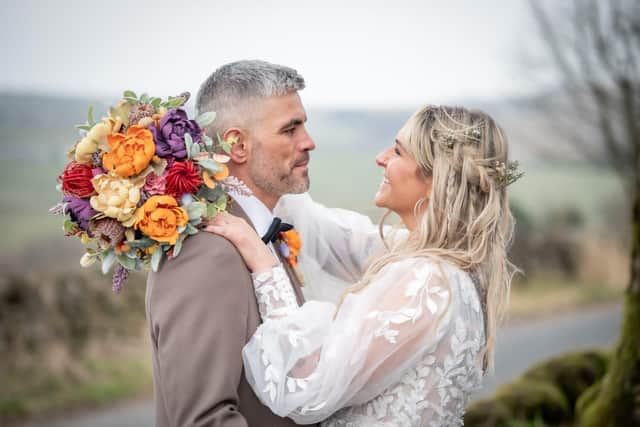 Kirsty and Joe Brunt on their wedding day at The Alma Inn in Colne last year. The couple won the dream day in a competition to find the most deserving recipient of the £10,000 wedding package.