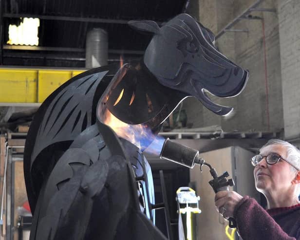 Marjan Wouda gives Dandy his black finish at Castle Fine Art Foundry workshop in Liverpool