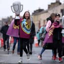 BURNLEY, ENGLAND - APRIL 22: Supporters of Burnley arrive at Turf Moor prior to the Sky Bet Championship between Burnley and Queens Park Rangers at Turf Moor on April 22, 2023 in Burnley, England. (Photo by Alex Livesey/Getty Images)