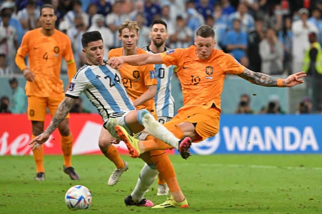 Netherlands' forward #19 Wout Weghorst scores his team's second goal during the Qatar 2022 World Cup quarter-final football match between Netherlands and Argentina at Lusail Stadium, north of Doha, on December 9, 2022. (Photo by Alberto PIZZOLI / AFP) (Photo by ALBERTO PIZZOLI/AFP via Getty Images)
