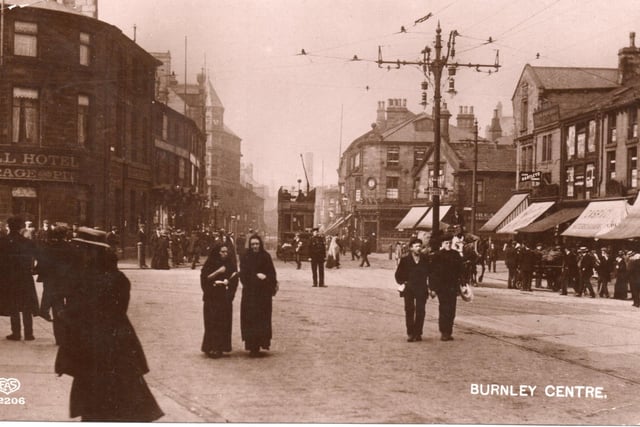 A splendid image of the gormless, with  the Bull, left, and a double decker tram on St James Street. The card was posted in 1914.