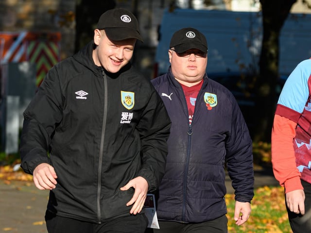 Burnley fans arrive at Turf Moor ahead of the Championship fixture with Blackburn Rovers which ended in a 3-0 victory for the Clarets. Photo: Kelvin Stuttard