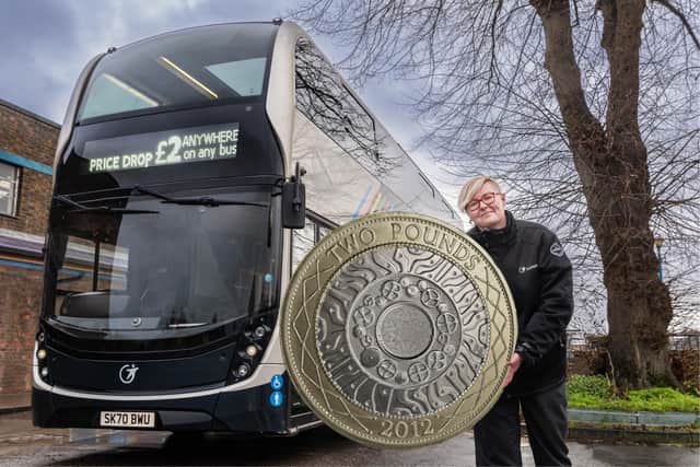 Transdev bus driver Kornelia Holmes celebrates as the Government confirms its £2 ‘Price Drop’ fare cap offering savings of up to 74 per cent across its East Lancashire network, will now continue until the end of June
