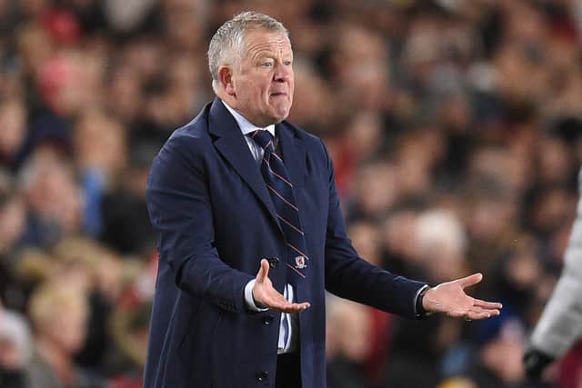 Middlesbrough's English manager Chris Wilder gestures on the touchline during the English FA cup quarter-final football match between Middlesbrough and Chelsea at the Riverside Stadium in Middlesbrough, north-east England on March 19, 2022. - - RESTRICTED TO EDITORIAL USE. No use with unauthorized audio, video, data, fixture lists, club/league logos or 'live' services. Online in-match use limited to 120 images. An additional 40 images may be used in extra time. No video emulation. Social media in-match use limited to 120 images. An additional 40 images may be used in extra time. No use in betting publications, games or single club/league/player publications. (Photo by Oli SCARFF / AFP) / RESTRICTED TO EDITORIAL USE. No use with unauthorized audio, video, data, fixture lists, club/league logos or 'live' services. Online in-match use limited to 120 images. An additional 40 images may be used in extra time. No video emulation. Social media in-match use limited to 120 images. An additional 40 images may be used in extra time. No use in betting publications, games or single club/league/player publications. / RESTRICTED TO EDITORIAL USE. No use with unauthorized audio, video, data, fixture lists, club/league logos or 'live' services. Online in-match use limited to 120 images. An additional 40 images may be used in extra time. No video emulation. Social media in-match use limited to 120 images. An additional 40 images may be used in extra time. No use in betting publications, games or single club/league/player publications. (Photo by OLI SCARFF/AFP via Getty Images)