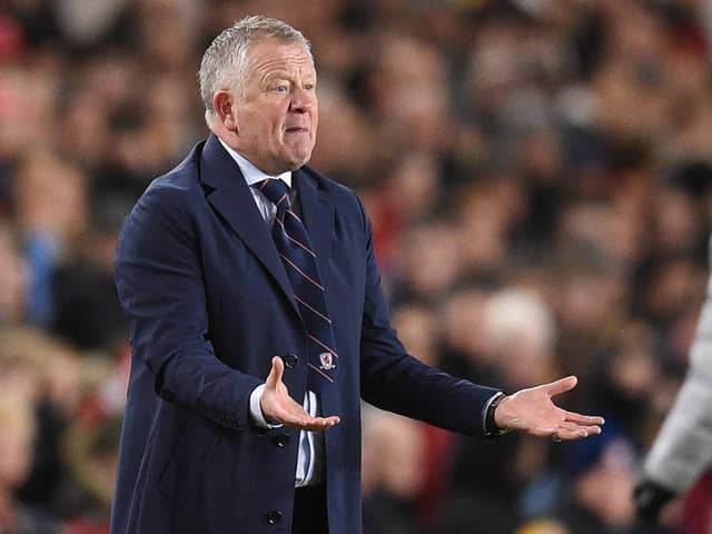 Middlesbrough's English manager Chris Wilder gestures on the touchline during the English FA cup quarter-final football match between Middlesbrough and Chelsea at the Riverside Stadium in Middlesbrough, north-east England on March 19, 2022. - - RESTRICTED TO EDITORIAL USE. No use with unauthorized audio, video, data, fixture lists, club/league logos or 'live' services. Online in-match use limited to 120 images. An additional 40 images may be used in extra time. No video emulation. Social media in-match use limited to 120 images. An additional 40 images may be used in extra time. No use in betting publications, games or single club/league/player publications. (Photo by Oli SCARFF / AFP) / RESTRICTED TO EDITORIAL USE. No use with unauthorized audio, video, data, fixture lists, club/league logos or 'live' services. Online in-match use limited to 120 images. An additional 40 images may be used in extra time. No video emulation. Social media in-match use limited to 120 images. An additional 40 images may be used in extra time. No use in betting publications, games or single club/league/player publications. / RESTRICTED TO EDITORIAL USE. No use with unauthorized audio, video, data, fixture lists, club/league logos or 'live' services. Online in-match use limited to 120 images. An additional 40 images may be used in extra time. No video emulation. Social media in-match use limited to 120 images. An additional 40 images may be used in extra time. No use in betting publications, games or single club/league/player publications. (Photo by OLI SCARFF/AFP via Getty Images)