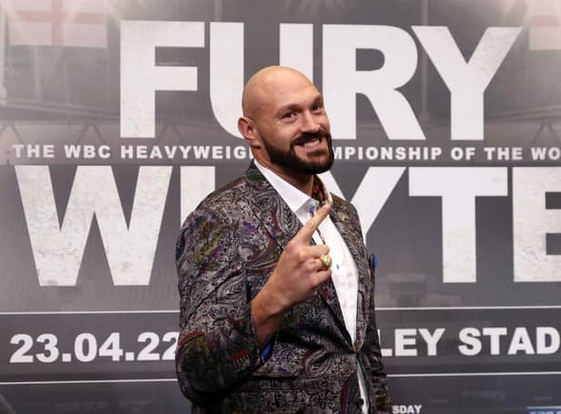 Tyson Fury gestures during the Tyson Fury v Dillian Whyte press conference at Wembley Stadium on March 01, 2022 in Londo
