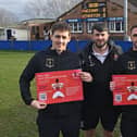 Pictured (left to right) at Padiham Football Club are striker Joel Brownhill, manager Michael Morrison and defender Lee Pugh. The club is backing physio Gill Lawrence's campaign to raise awareness of the condition Axial Spondyloarthritis, known as Axial SpA