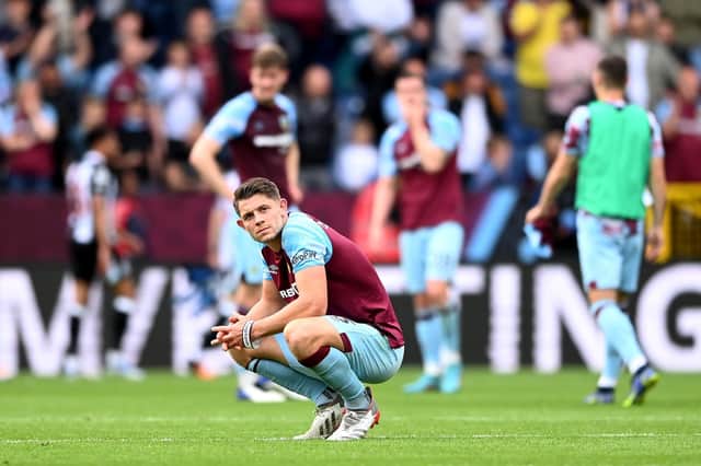BURNLEY, ENGLAND - MAY 22: James Tarkowski of Burnley looks dejected following defeat and relegation to the Sky Bet Championship following the Premier League match between Burnley and Newcastle United at Turf Moor on May 22, 2022 in Burnley, England. (Photo by Gareth Copley/Getty Images)
