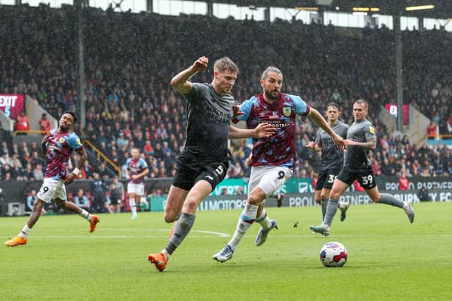 Burnley's Jay Rodriguez battles with Cardiff City's Mark McGuinness

The EFL Sky Bet Championship - Burnley v Cardiff City - Monday 8th May 2023 - Turf Moor - Burnley