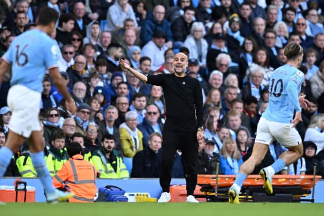Manchester City's Spanish manager Pep Guardiola shouts instructions to the players from the touchline during the English Premier League football match between Manchester City and Southampton at the Etihad Stadium in Manchester, north west England, on October 8, 2022.
