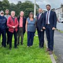 Coun. Asjad Mahmood and Coun. Zafar Ali with Ward Coun. Mohammad Aslam (second left), Chris McKee, the Council's Green Spaces Assistant (fourth left) and Friends of Pendle Parks volunteers at Walverden Park in Nelson