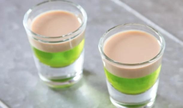 Ingredients: 22.5ml chilled Melon Liqueur, 22.5ml chilled Irish Cream Liqueur. Method: Pour the Midori melon liqueur into a shot glass, filling it halfway, float the Irish cream on top, hold a bar spoon upside down over the drink and slowly pour the Irish cream over it, moving the spoon up as the glass fills.