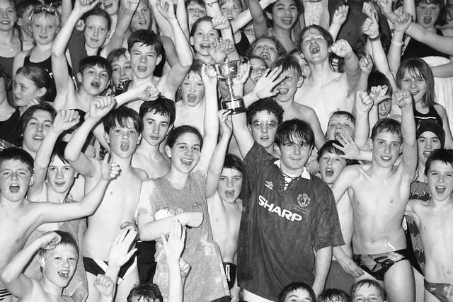 Pupils from Central Lancaster High School got in the swim for their annual gala. The swimming gala was held at the Kingsway baths, Lancaster, and proved a great success with those taking part and their supporters. Pictured, from left: The captains of Lunesdale House, Emily Dixon and Robert Lloyd, hold aloft their winning trophy