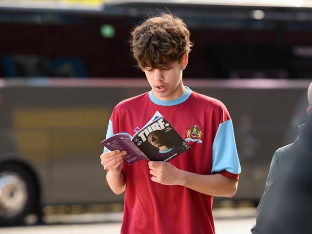 Burnley fans arrive at Turf Moor for the Premier League fixture against Brighton and Hove Albion. Photo: Kelvin Lister-Stuttard