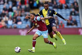BURNLEY, ENGLAND - MARCH 03: Wilson Odobert of Burnley is challenged by Antoine Semenyo of AFC Bournemouth during the Premier League match between Burnley FC and AFC Bournemouth at Turf Moor on March 03, 2024 in Burnley, England. (Photo by Matt McNulty/Getty Images)