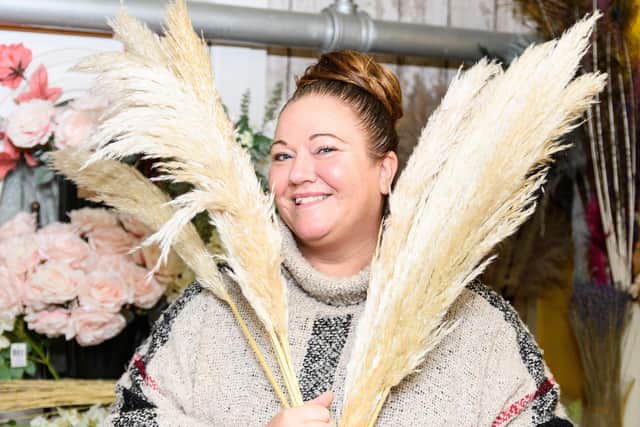 Kathryn Beaver owner of LilyRose Floristry in Burnley is affectionately known to many people as the 'pampas grass queen' thanks to the many creations she designs with them