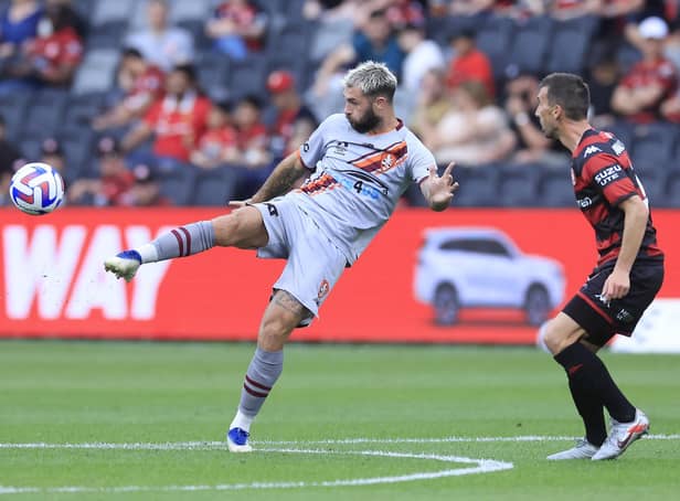 SYDNEY, AUSTRALIA - OCTOBER 22: Charlie Austin of the Roar passes during the round three A-League Men's match between Western Sydney Wanderers and Brisbane Roar at CommBank Stadium, on October 22, 2022, in Sydney, Australia. (Photo by Mark Evans/Getty Images)