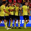 LISBON, PORTUGAL - JULY 25:  Owen Dodgson of Burnley FC celebrates with teammates after scoring a goal during the Pre-Season Friendly match between SL Benfica and Burnley FC at Estadio do Restelo on July 25, 2023 in Lisbon, Portugal.  (Photo by Gualter Fatia/Getty Images)
