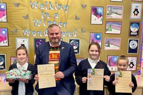 Pendle MP Andrew Stephenson with the winner and runners-up from his Christmas card competition