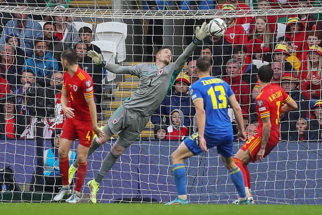 Wales' goalkeeper Wayne Hennessey (C) makes a save during the FIFA World Cup 2022 play-off final qualifier football match between Wales and Ukraine at the Cardiff City Stadium in Cardiff, south Wales, on June 5, 2022. (Photo by Geoff Caddick / AFP) (Photo by GEOFF CADDICK/AFP via Getty Images)