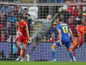 Wales' goalkeeper Wayne Hennessey (C) makes a save during the FIFA World Cup 2022 play-off final qualifier football match between Wales and Ukraine at the Cardiff City Stadium in Cardiff, south Wales, on June 5, 2022. (Photo by Geoff Caddick / AFP) (Photo by GEOFF CADDICK/AFP via Getty Images)