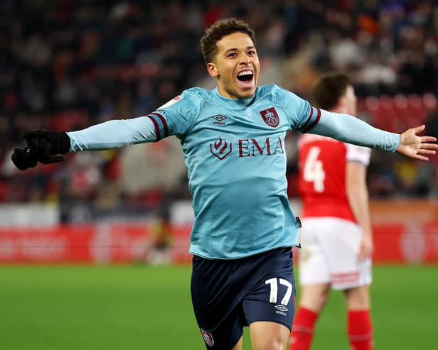 ROTHERHAM, ENGLAND - APRIL 18: Manuel Benson of Burnley celebrates after scoring the team's second goal during the Sky Bet Championship match between Rotherham United and Burnley at AESSEAL New York Stadium on April 18, 2023 in Rotherham, England. (Photo by Matt McNulty/Getty Images)