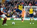 BURNLEY, ENGLAND - APRIL 11:  Francis Coquelin of Arsenal and Sam Vokes of Burnley compete for the ball during the Barclays Premier League match between Burnley and Arsenal at Turf Moor on April 11, 2015 in Burnley, England.  (Photo by Laurence Griffiths/Getty Images)
