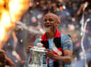 LONDON, ENGLAND - MAY 18: Vincent Kompany of Manchester City lifts the trophy following the FA Cup Final match between Manchester City and Watford at Wembley Stadium on May 18, 2019 in London, England. (Photo by Richard Heathcote/Getty Images)