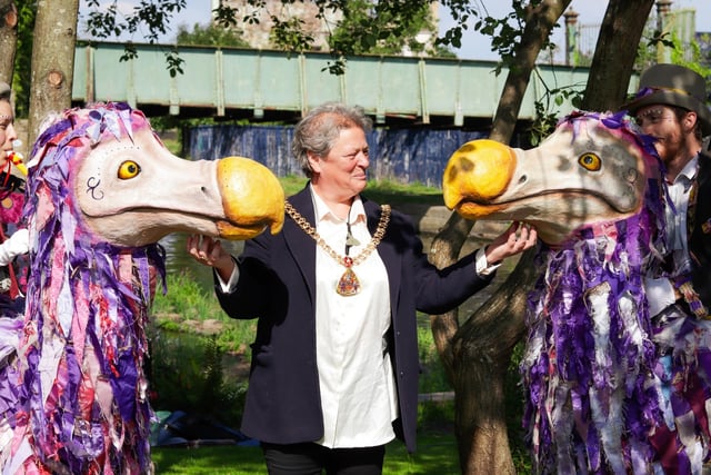 Mayor of Burnley Coun. Cosima Towneley meets two characters at the festival