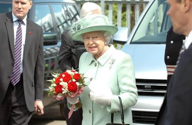 ROYAL VISIT 2012: The Queen, the Duke of Edinburgh and the Prince of Wales visit Slater Terrace in Burnley.