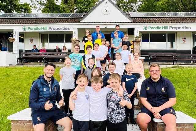 Pendle Hill Properties and local youngsters at Padiham Cricket Club