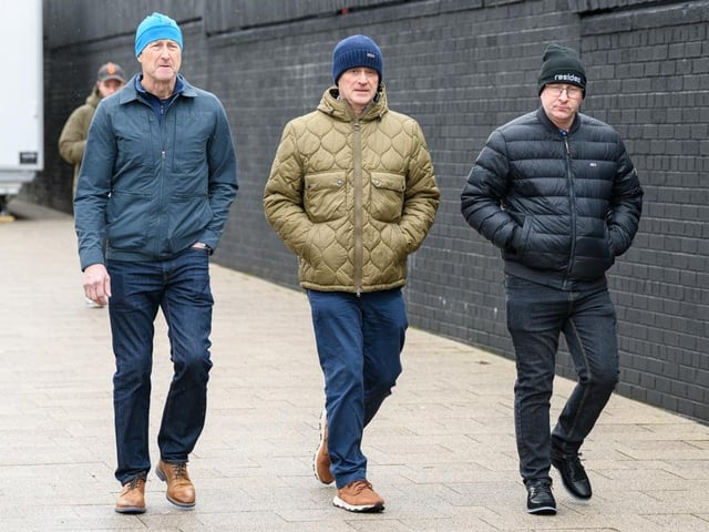 Burnley fans arrive at Turf Moor for the Premier League fixture against West Ham United. Photo: Kelvin Lister-Stuttard