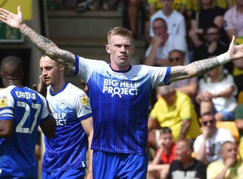 James McClean celebrates opening the scoring for Wigan Athletic against Norwich City at Carrow Road