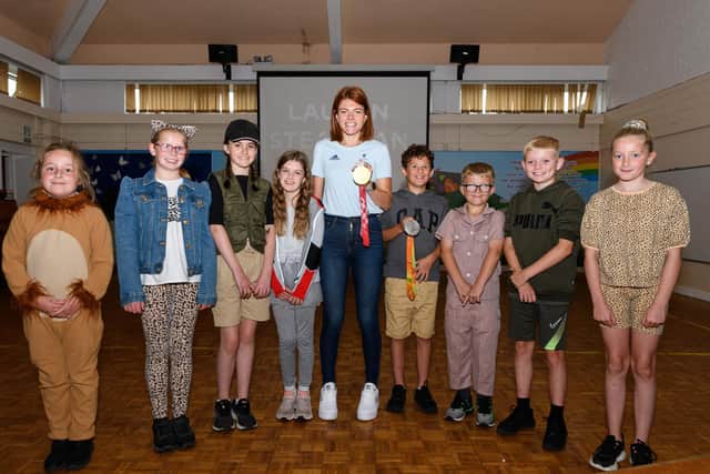 Lauren Steadman, paralympic gold medallist and Strictly winner with pupils from years three, four, five and six at Sacred Heart School, Colne. Photo: Kelvin Stuttard