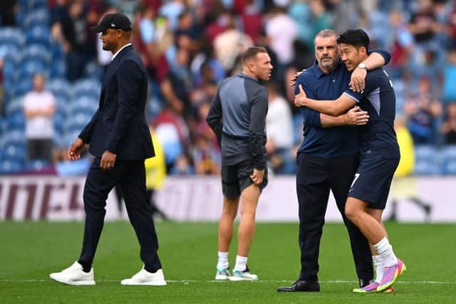 BURNLEY, ENGLAND - SEPTEMBER 02: Ange Postecoglou, Manager of Tottenham Hotspur, embraces Heung-Min Son of Tottenham Hotspur after the Premier League match between Burnley FC and Tottenham Hotspur at Turf Moor on September 02, 2023 in Burnley, England. (Photo by Gareth Copley/Getty Images)
