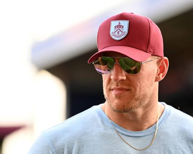 BURNLEY, ENGLAND - AUGUST 11: J.J. Watt is interviewed prior to the Premier League match between Burnley FC and Manchester City at Turf Moor on August 11, 2023 in Burnley, England. (Photo by Michael Regan/Getty Images)