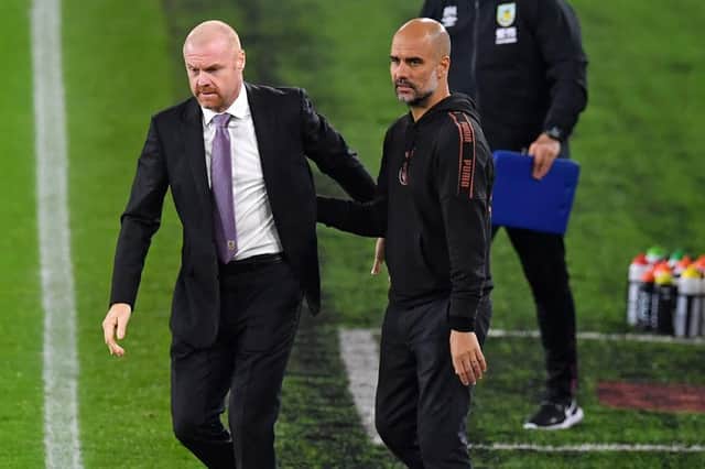 Sean Dyche and Pep Guardiola.  (Photo by PAUL ELLIS/POOL/AFP via Getty Images)