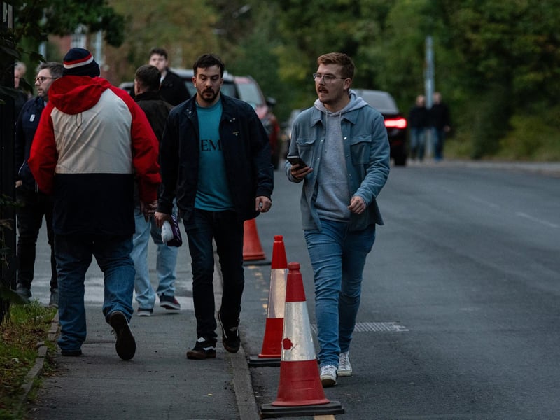 Burnley fans arrive at the Peninsula Stadium for the Carabao Cup tie with Salford City. Photo: Kelvin Lister-Stuttard